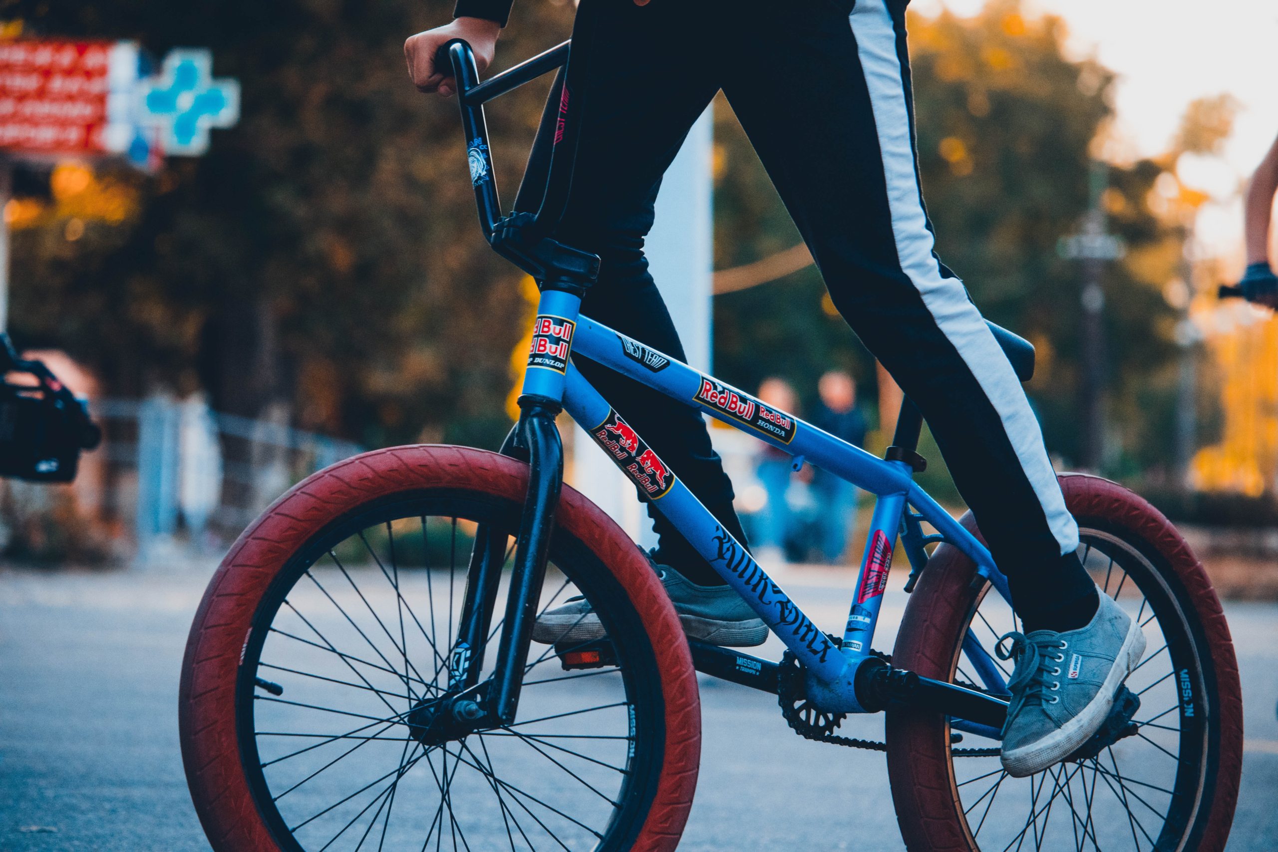 young man riding BMX bike