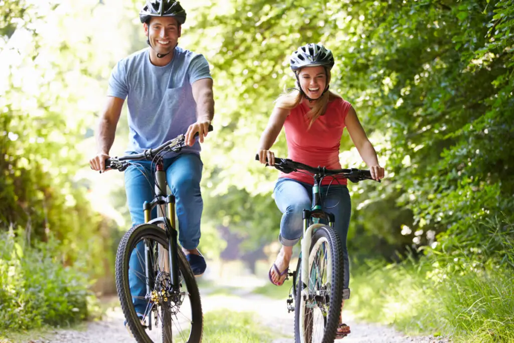 happy couple biking